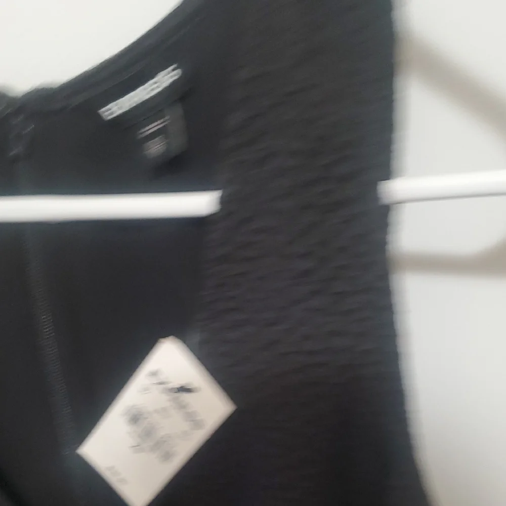 Express Black Sleeveless Peplum Blouse - Picture 2 of 3